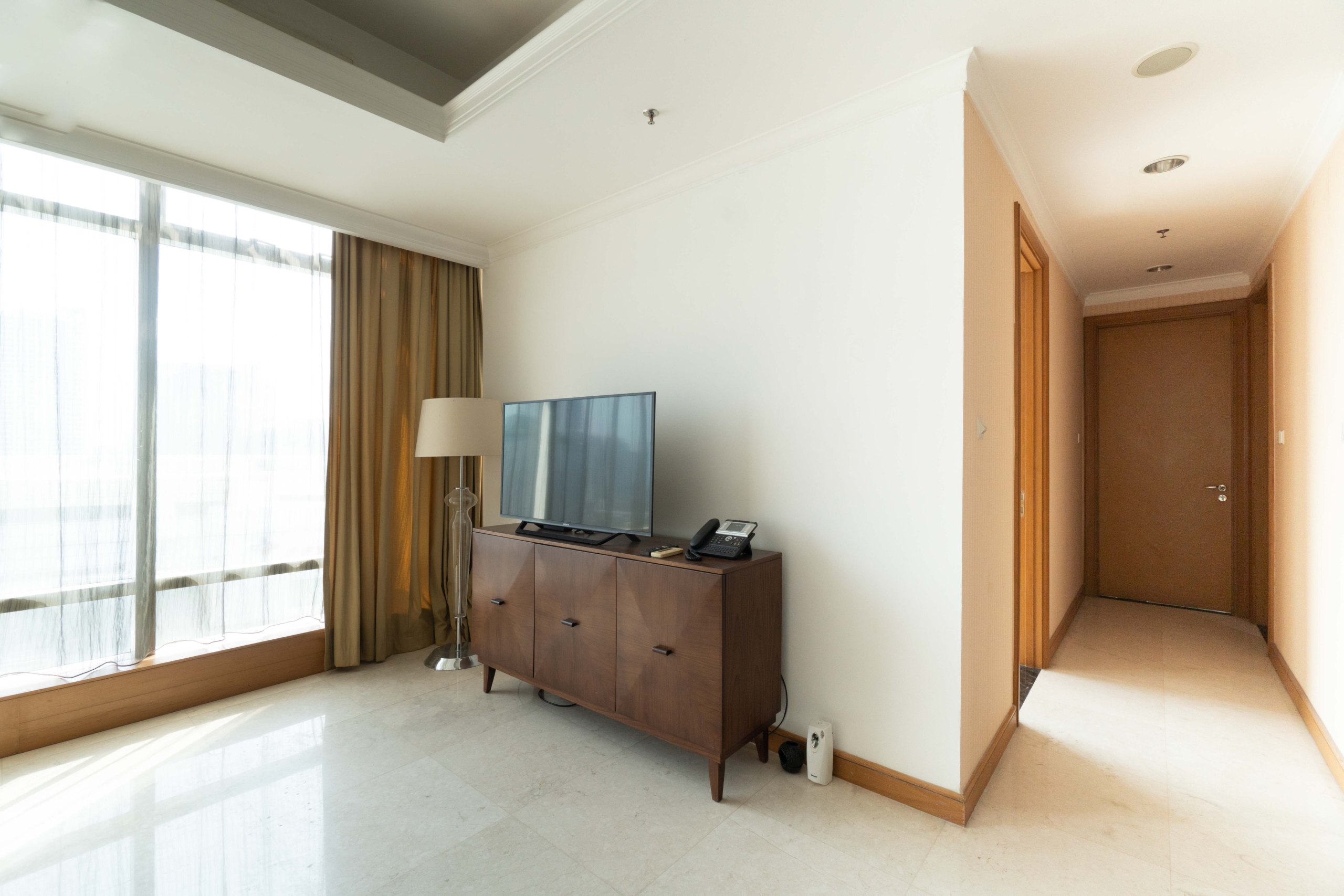 Kempinski Private Residence-2BR-Living room TV