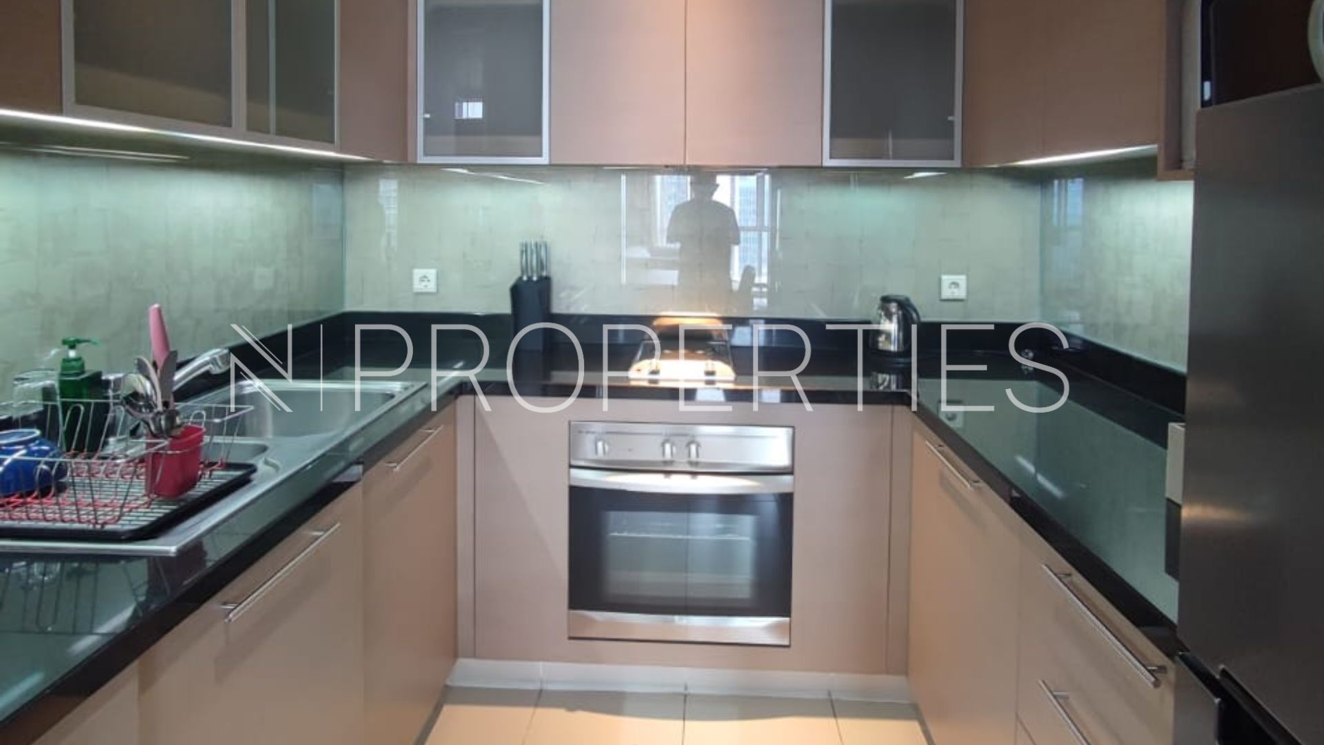 MEGA KUNINGAN – 2BR – KITCHEN AREA Oakwood Premier Cozmo – Elegant 2BR Executive