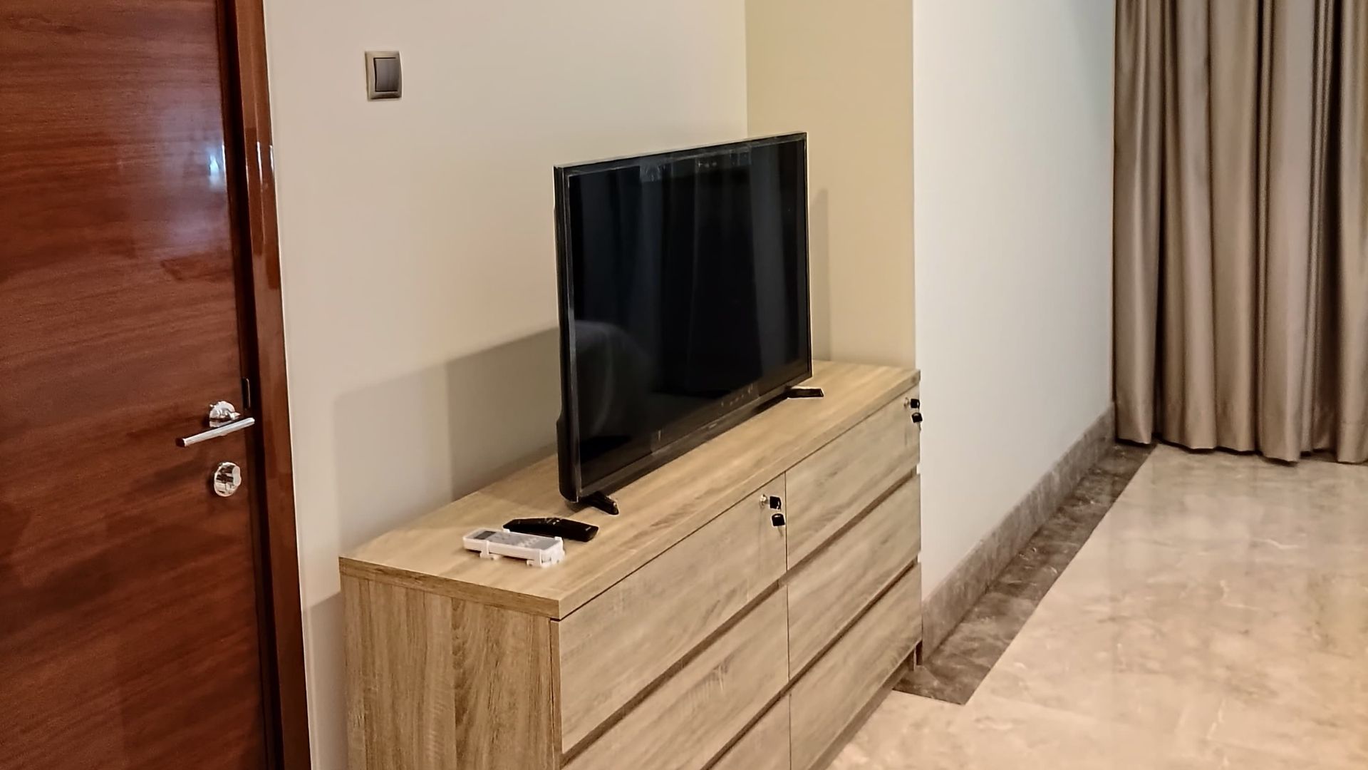 District 8-2BR-Wooden Storage and TV Contemporary 2BR Apartment at District 8