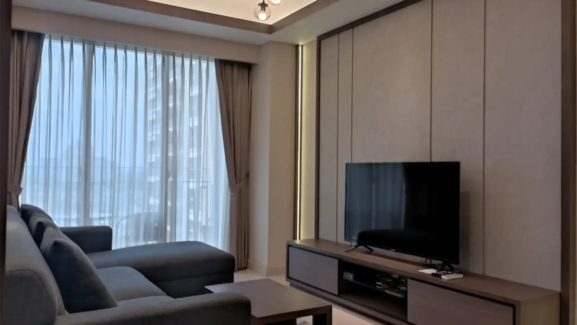 PONDOK INDAH RESIDENCE-2BR-LIVING AREA WITH STORAGE TABLE Practical 2BR – Pondok Indah Residence