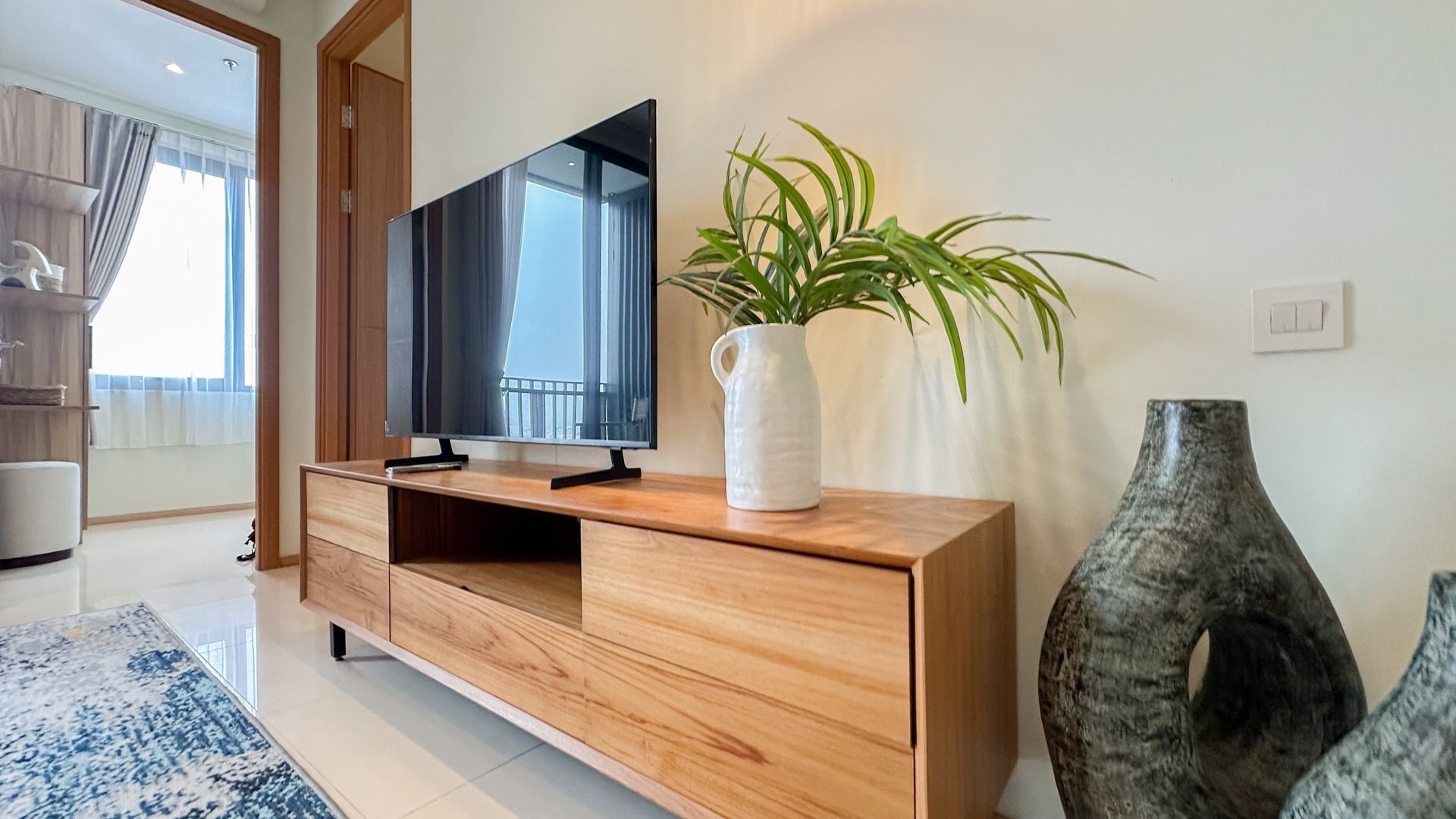 Samara Suites-2BR-Living room tv Walkable LRT Access at Samara Suites
