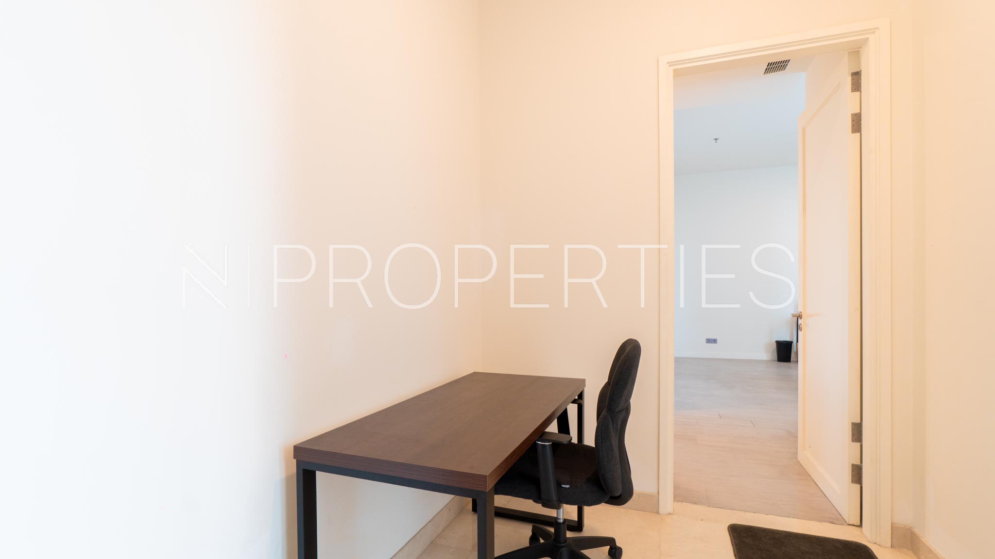 THE STATURE-2BR-OFFICE TABLE Spacious 2BR Residence – The Stature Menteng